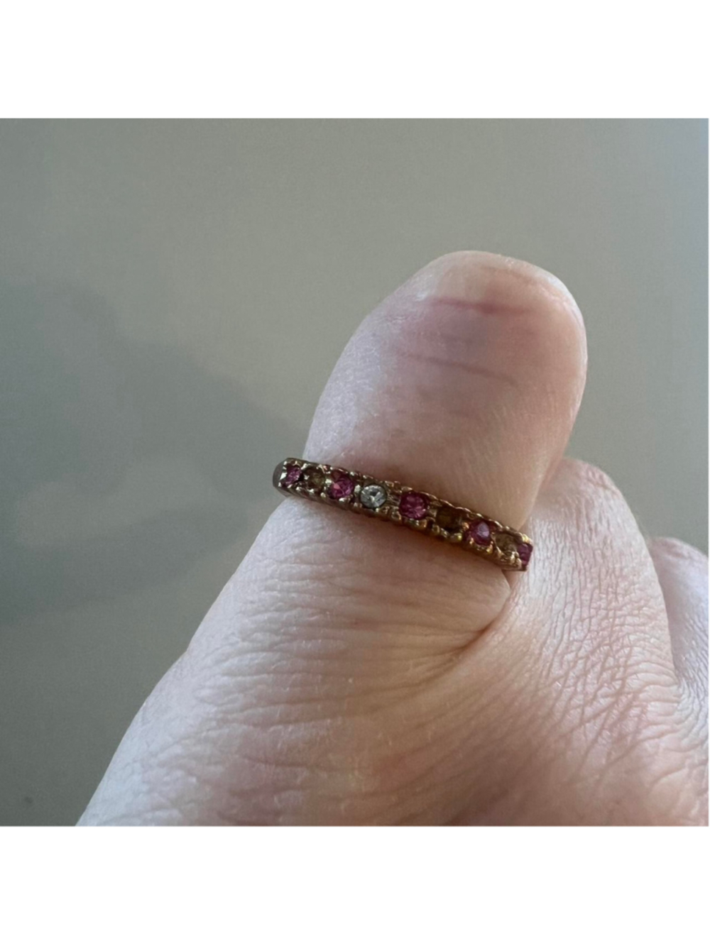 Vintage gold ring with pink and clear Swarovski crystals

Some crystals missing